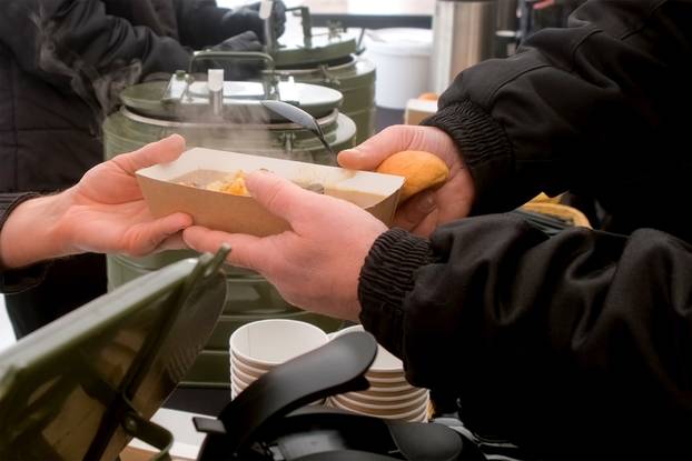 Chef,Cook,Serving,Nourishing,Hot,Meals,Soup,For,Fishermen,On