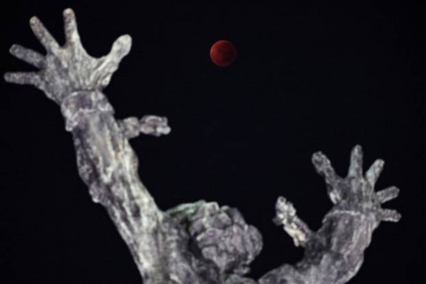 Total lunar eclipse rises over Jakarta