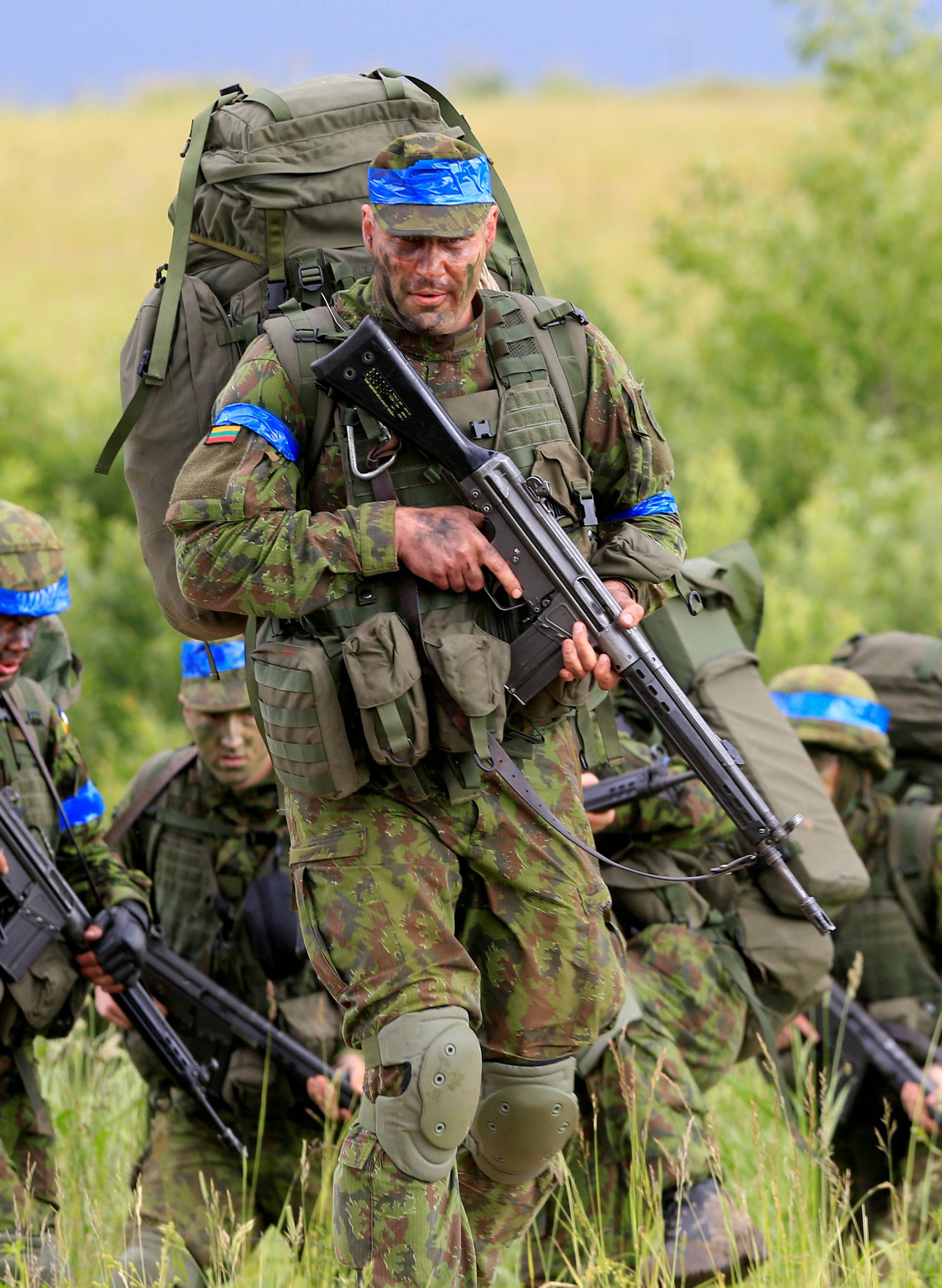 FILE PHOTO: Lithuanian army soldiers take part in Suwalki gap defence exercise in Mikyciai