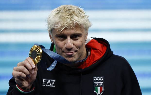 Swimming - Men's 100m Breaststroke Victory Ceremony