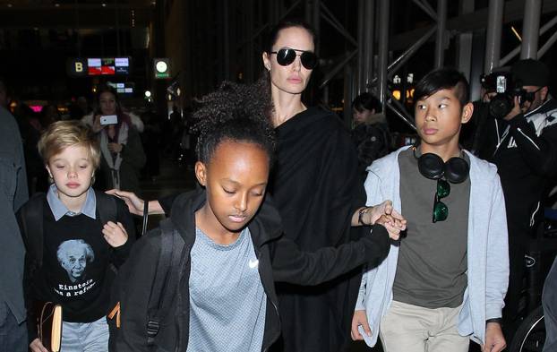 Angelina Jolie coming through LAX Airport, with her children Shiloh, Pax and Zahara. 7 March 2016.