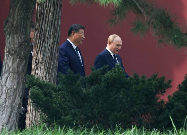 Russian President Vladimir Putin meets with Chinese President Xi Jinping in Beijing