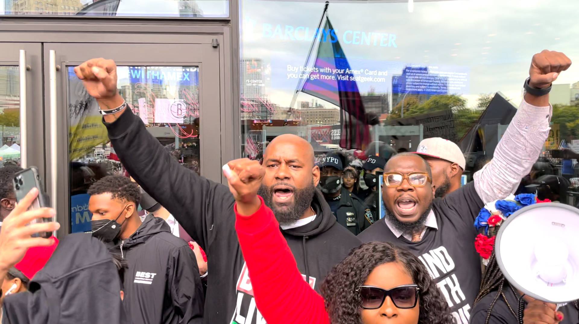 Demonstrators shout slogans outside the Barclays Center in New York