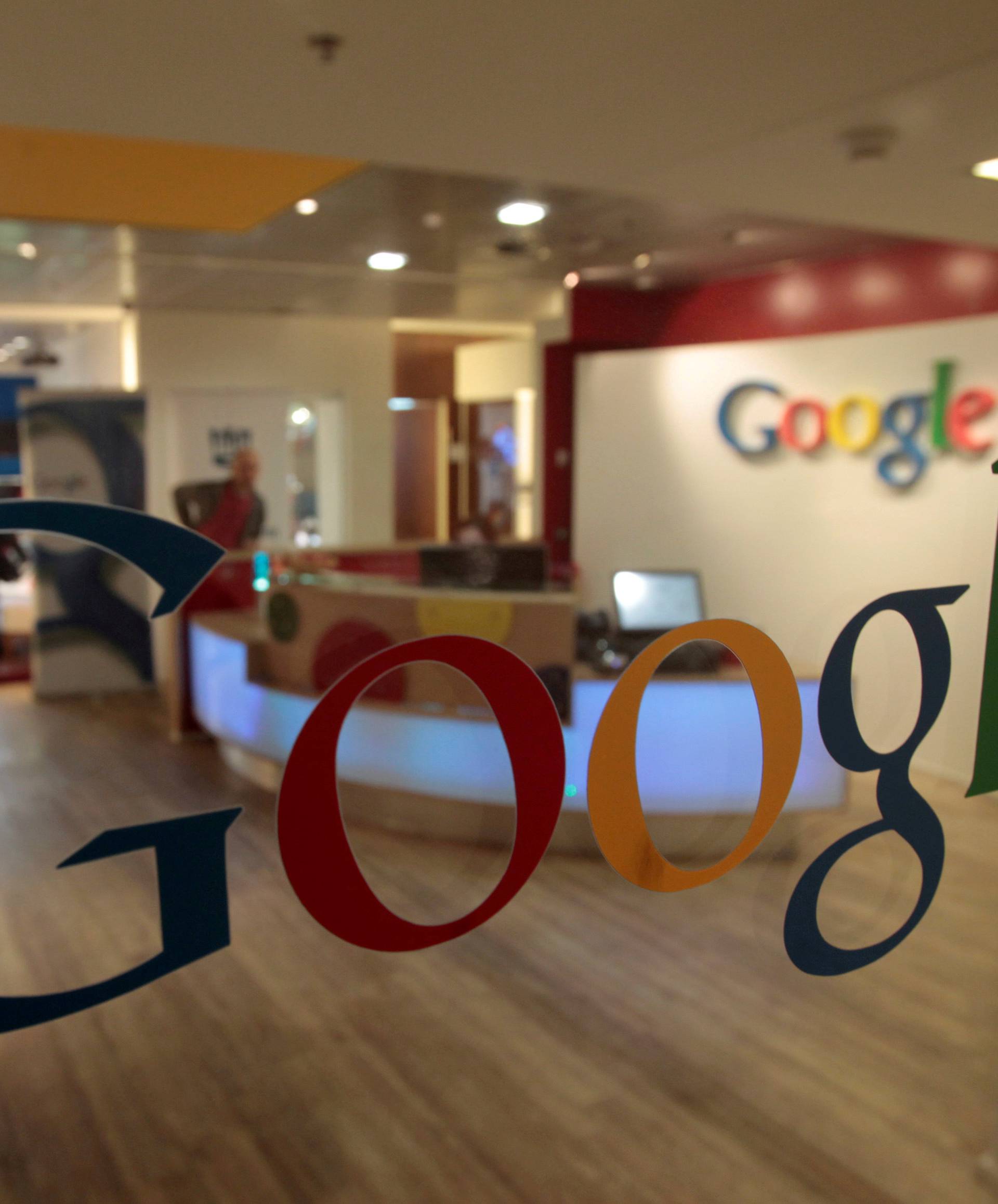FILE PHOTO: The Google logo is seen on a door at the company's office in Tel Aviv