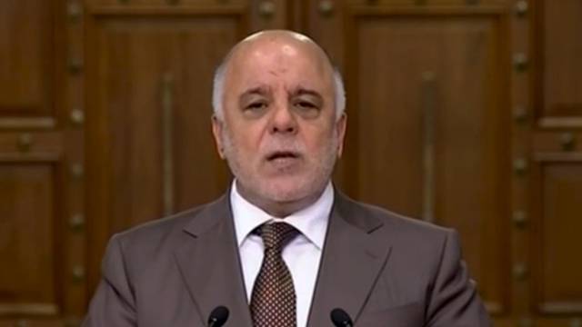 Iraqi Prime Minister Haider al-Abadi speaks during a news conference in Baghdad