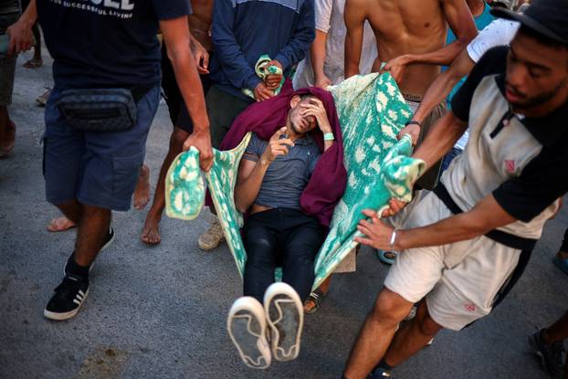 Mass crossings of migrants on foot and by sea from Morocco into Spanish territory, in Ceuta