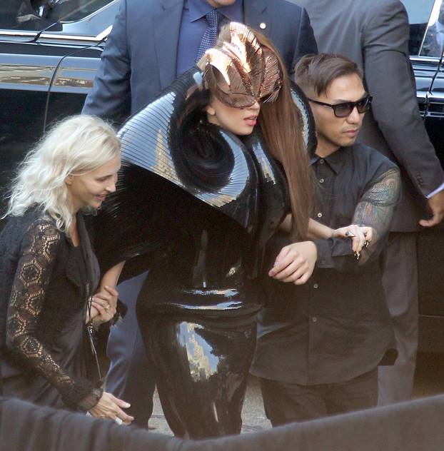 U.S singer Lady Gaga arrives with a horse carriage at her Macy