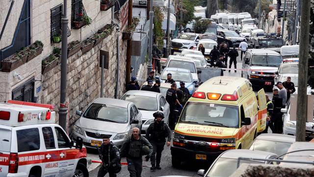 Security and rescue personnel work at a scene where a suspected incident of shooting attack took place, police spokesman said, just outside Jerusalem's Old City