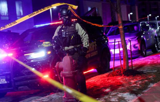 Protest outside the hotel where Bovino, who has been removed from his role, is reportedly staying, in Maple Grove