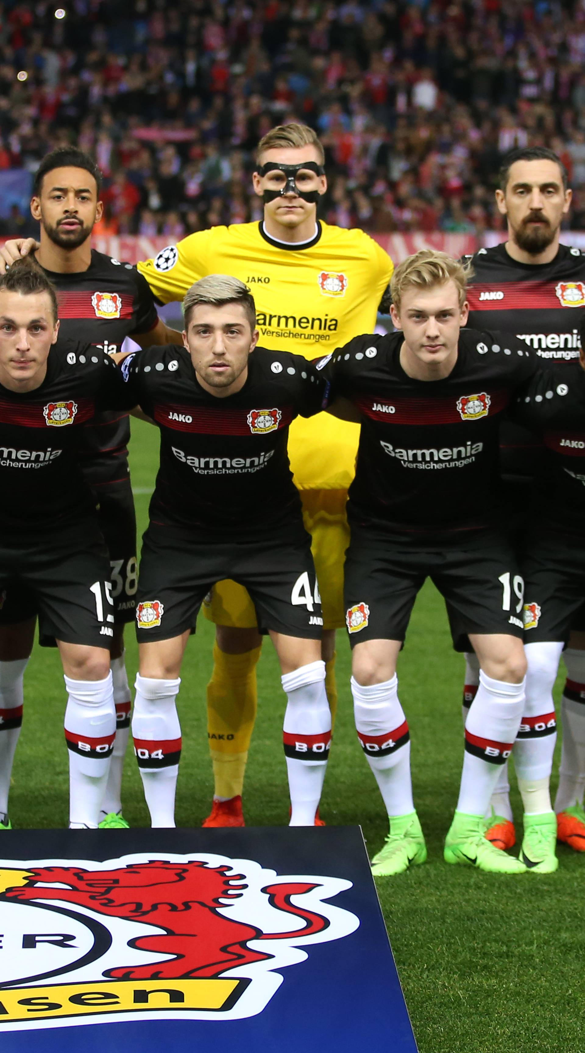 Bayer Leverkusen players pose for a team group photo before the match
