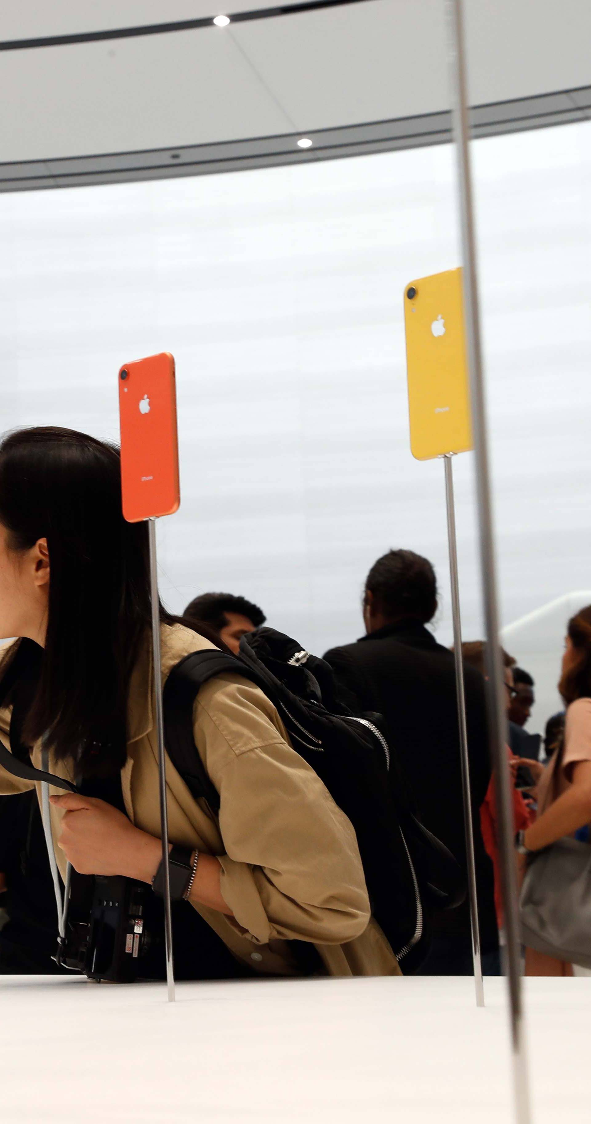 A demonstration of the newly released Apple products is seen following the product launch event in Cupertino