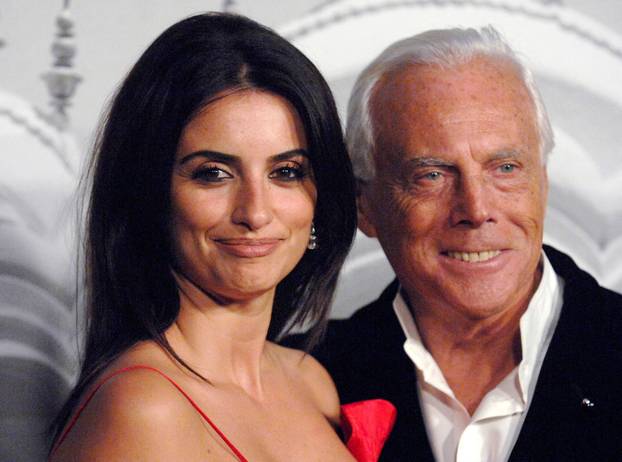 FILE PHOTO: Actress Penelope Cruz  poses with Giorgio Armani at the Giorgio Armani Prive event in Los Angeles, California