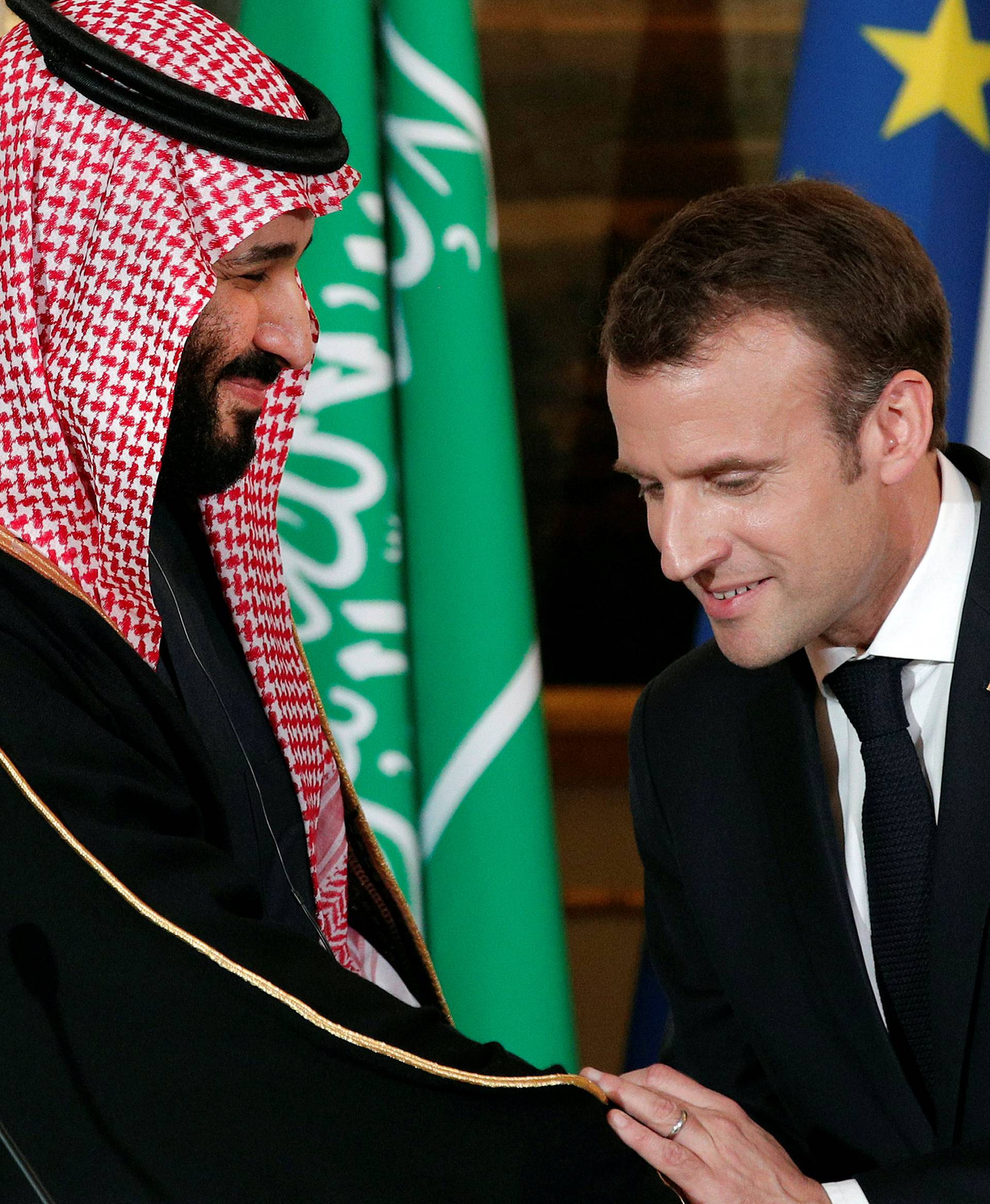 French President Emmanuel Macron and Saudi Arabia's Crown Prince Mohammed bin Salman attend a press conference at the Elysee Palace in Paris