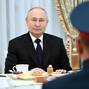 Russian President Putin meets with servicemen involved in Russia-Ukraine conflict, in Moscow