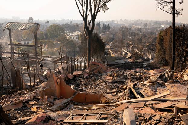 The remains of a home following the Palisades Fire in the Pacific Palisades neighborhood in Los Angeles