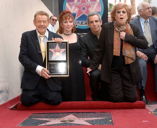 FILE PHOTO: Brother and sister Amy and Ben Stiller pose for pictures at a ceremony where their parents Jerry Stiller and Anne Meara are honored with a star on the Hollywood Walk of Fame in Los Angeles, California