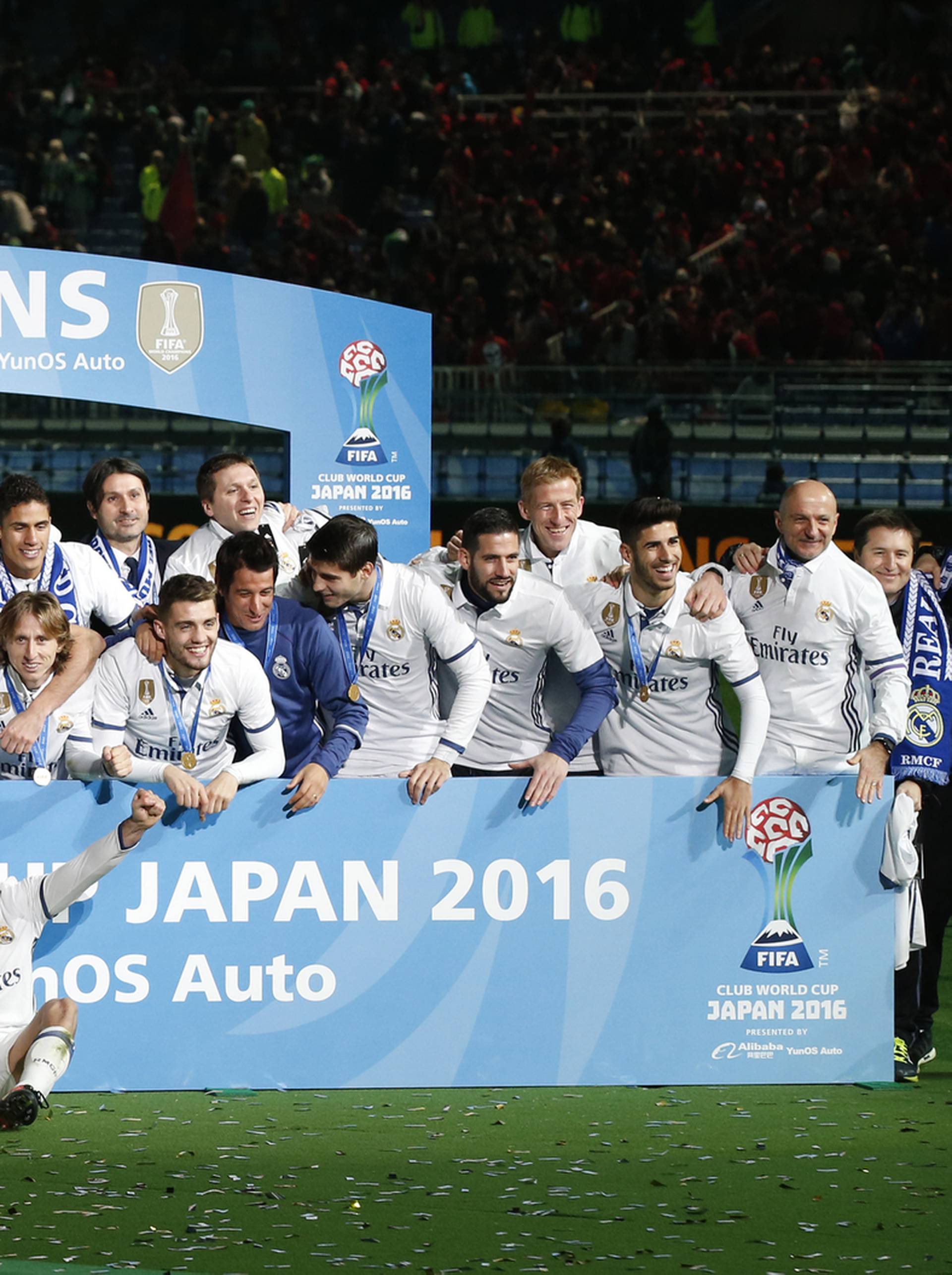 Real Madrid celebrate winning the FIFA Club World Cup Final with the trophy