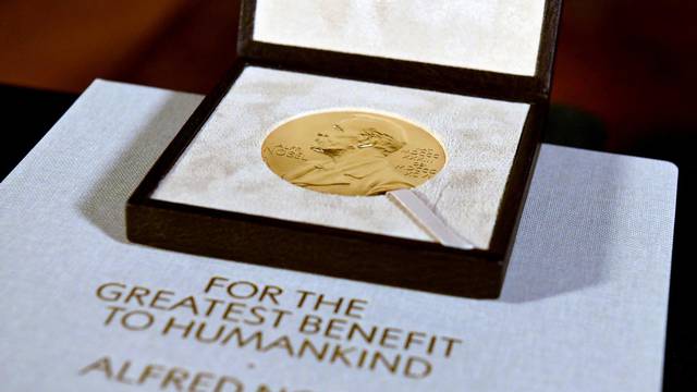 FILE PHOTO: The Nobel Prize medal, presented to Charles M. Rice in Physiology or Medicine, is seen after Swedish Consul General Annika Rembe presented it to him at her residence in New York City