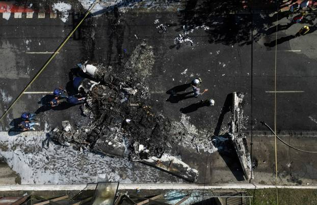 Small plane crashes into vehicles on busy Sao Paulo avenue