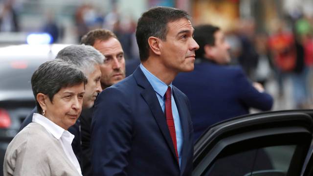 Spain's acting Prime Minister Pedro Sanchez visits the National Police headquarters in Barcelona