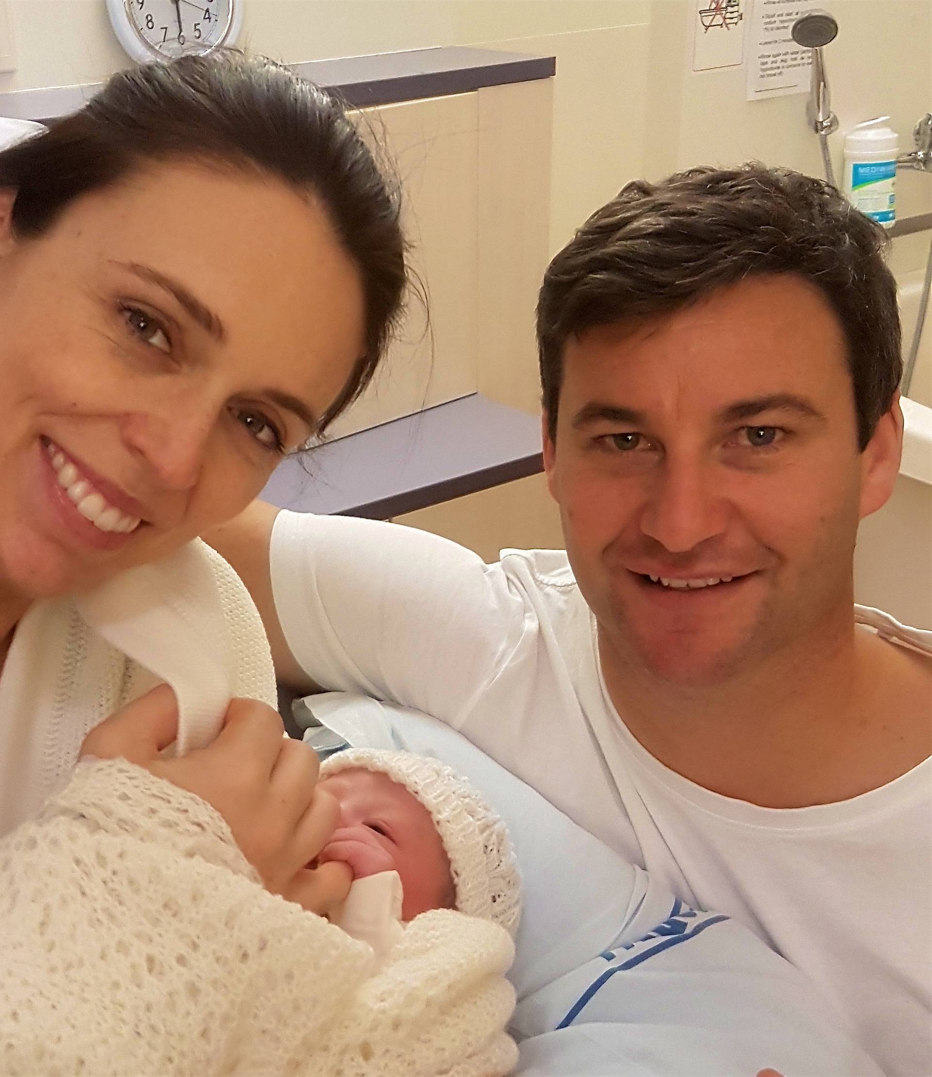 New Zealand Prime Minister Jacinda Ardern is seen with her baby daughter and partner Clarke Gayford at Auckland City Hospital