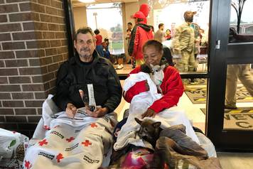 Kenneth and Minnie Bice prepare to sleep outside the M.O. Campbell Red Cross shelter in Aldine