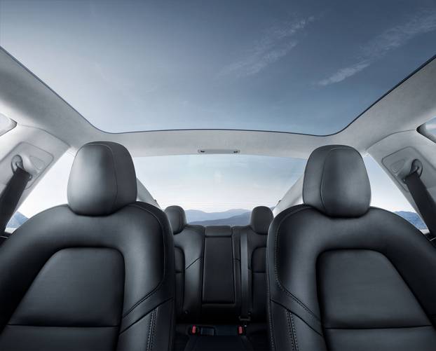 The interior of the Tesla Model 3 sedan is seen in this undated handout image as the car company handed over its first 30 Model 3 vehicles to employee buyers at the companyâs Fremont facility