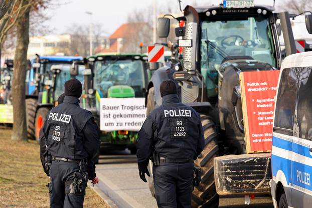 German farmers take part in a protest against the cut of vehicle tax subsidies of the so-called German Ampel coalition government, in Cottbus