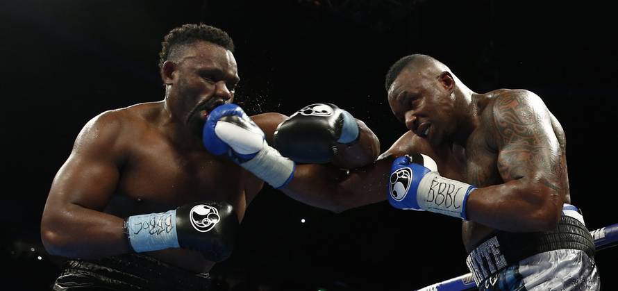 Dillian Whyte (R) in action against Dereck Chisora