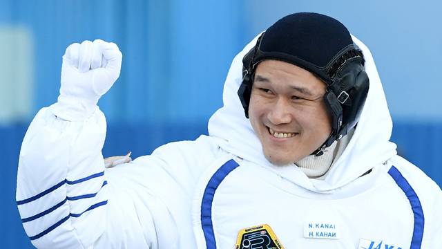 FILE PHOTO: Norishige Kanai of the Japan Aerospace Exploration Agency (JAXA) during the send-off ceremony after checking their space suits before the launch of the Soyuz MS-07 spacecraft at the Baikonur cosmodrome