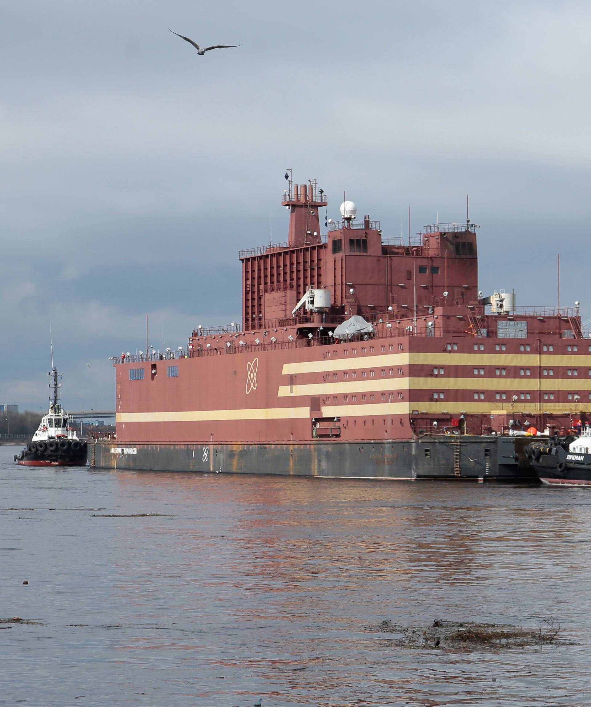 The floating nuclear power plant "Akademik Lomonosov" is seen being towed to Murmansk for nuclear fuel loading, in St. Petersburg