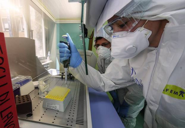 A medical technician works in the laboratory of the Infectious diseases department for coronavirus (COVID-19)