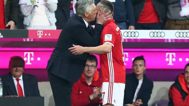 Bayern Munich coach Carlo Ancelotti kisses Bayern Munich's Franck Ribery