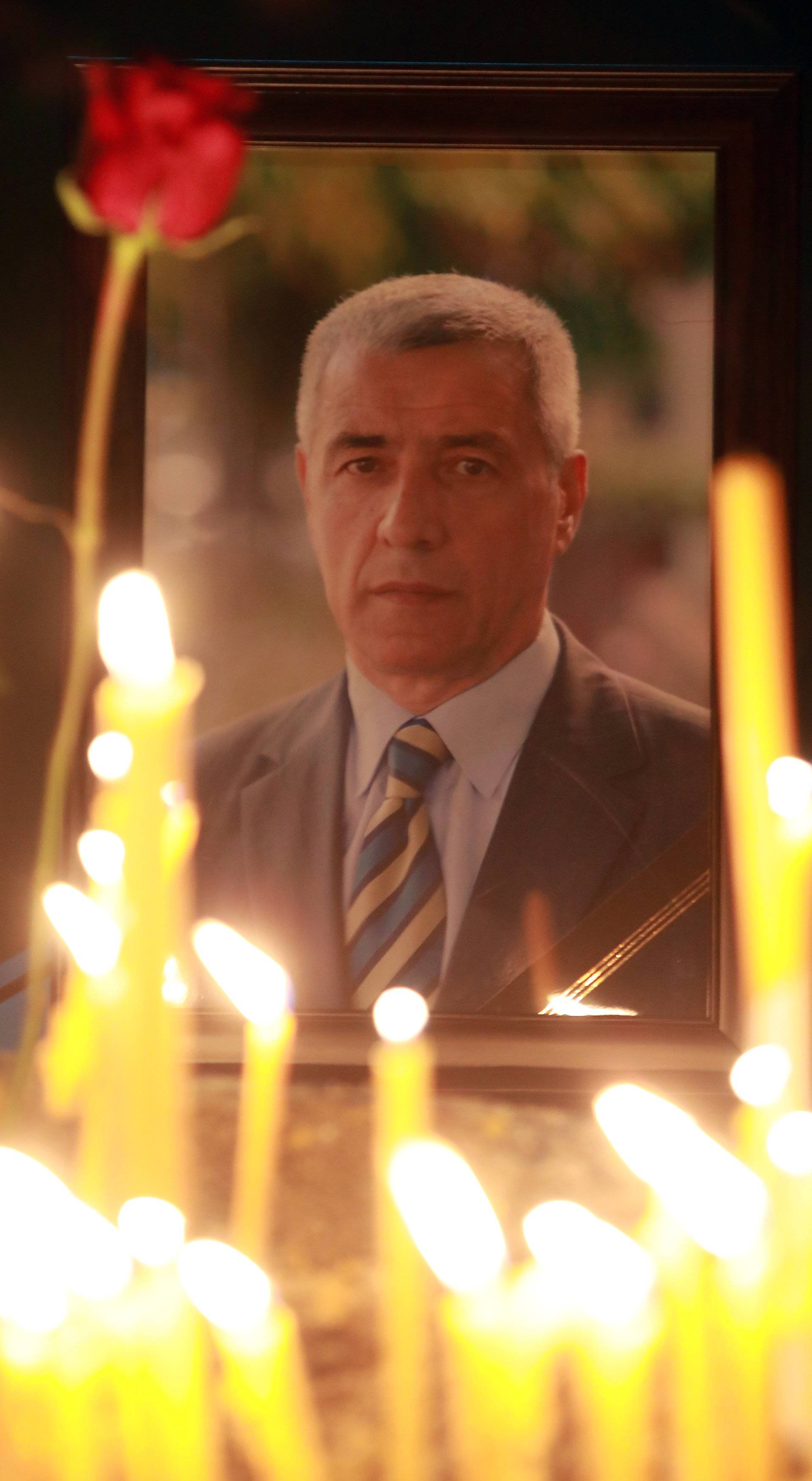 A picture of Kosovo Serb leader Oliver Ivanovic is seen during a commemoration in Kosovska Mitrovica