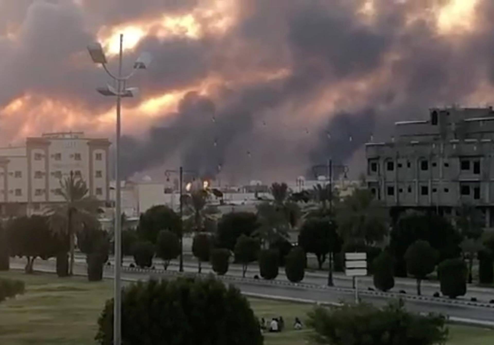 Smoke is seen following a fire at an Aramco factory in Abqaiq