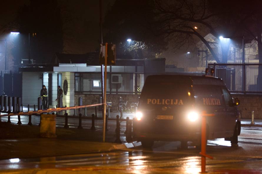 Police guard the entrance to the United States embassy in Podgorica