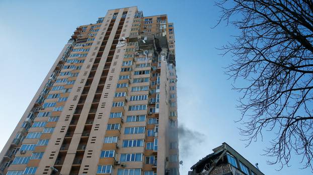 A view shows an apartment building damaged by recent shelling in Kyiv