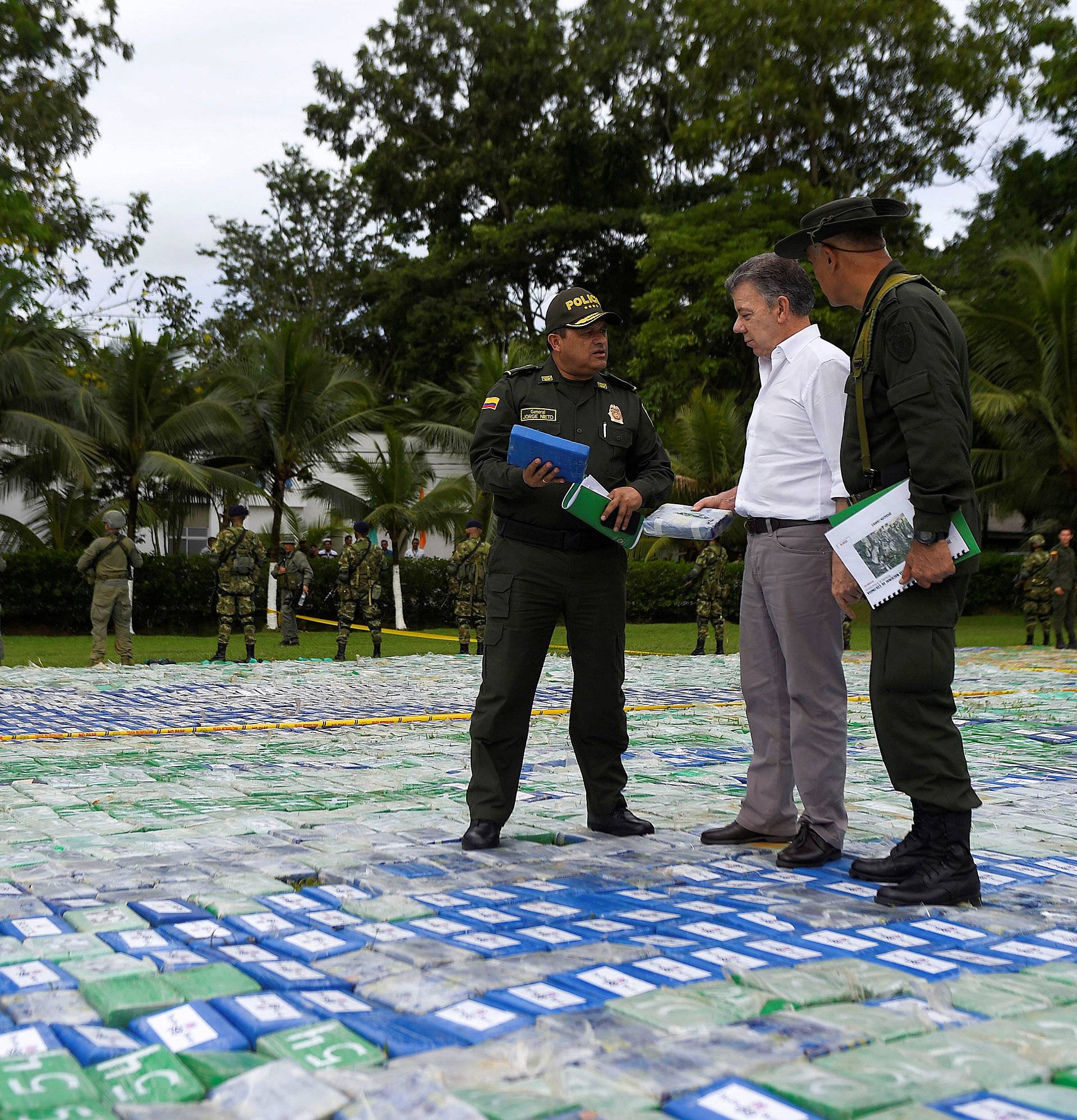 Colombia's President Juan Manuel Santos looks on after the seizure of more than 12 tons of cocaine in Apartado