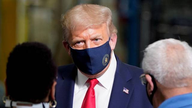 FILE PHOTO - U.S. President Donald Trump tours a Whirlpool Corporation washing machine factory in Clyde, Ohio