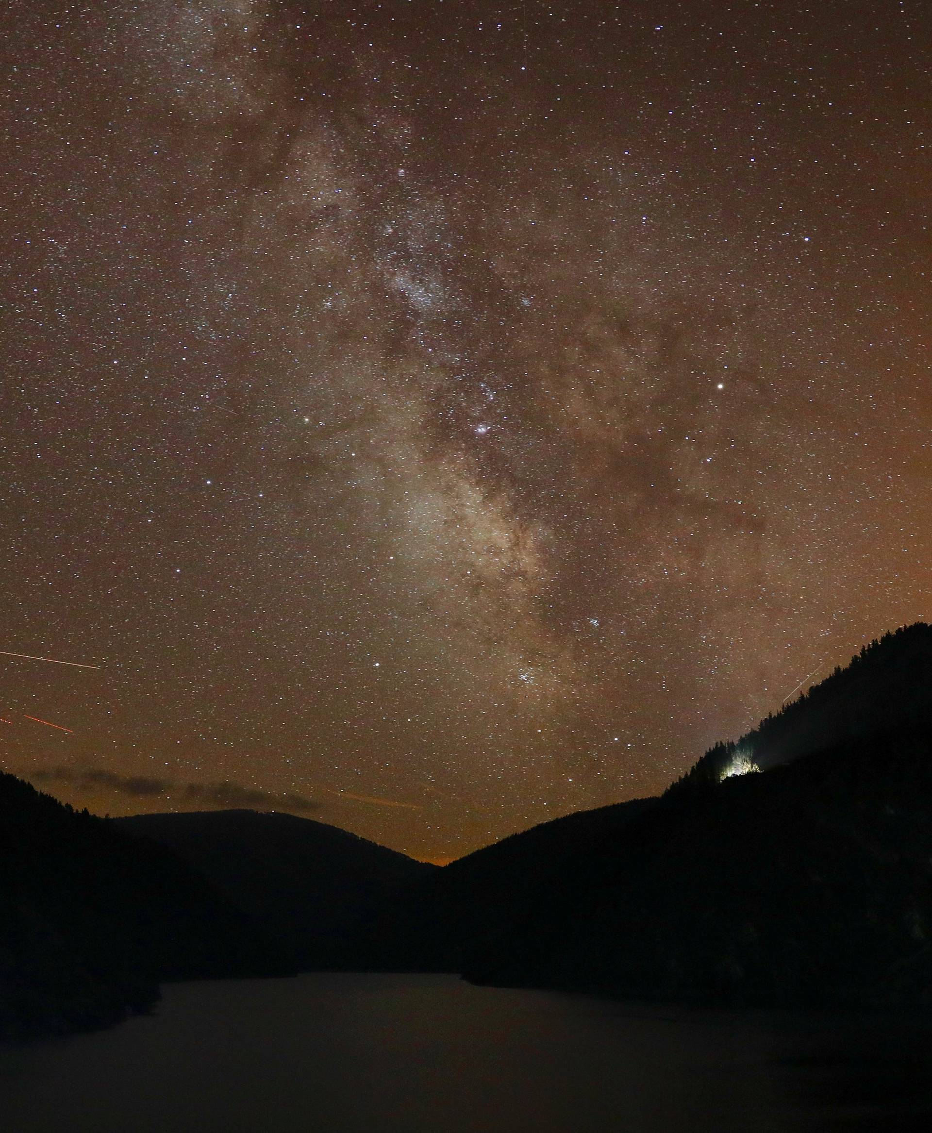 Milky Way is seen during the annual Perseid meteor shower above Salime Reservoir, near Grandas de Salime