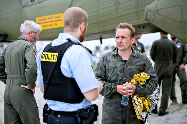 Danish submarine owner and inventor Peter Madsen lands with the help of the Danish defence in Dragor Harbor south of Copenhagen