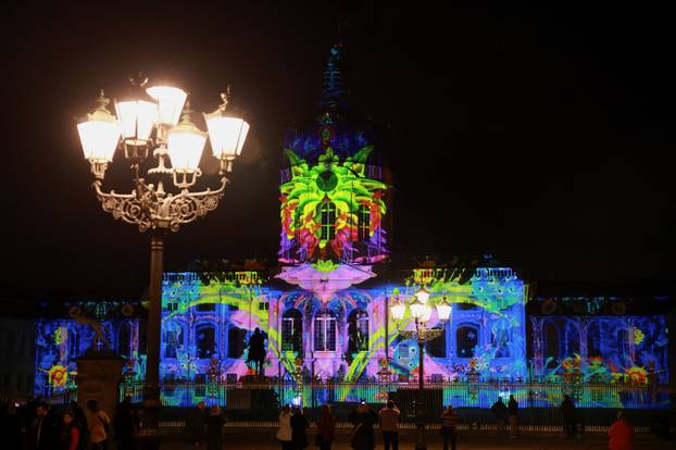 The Charlottenburg Castle is illuminated during the Festival of Lights in Berlin