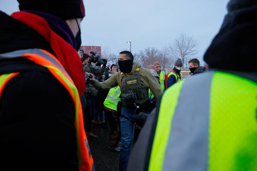 People protest against the fatal shooting of Renee Nicole Good by an ICE agent, in Minneapolis