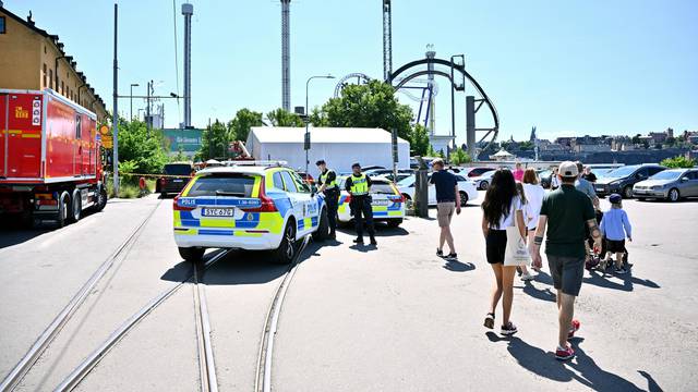 Police at the scene after roller coaster accident at amusement park in Stockholm