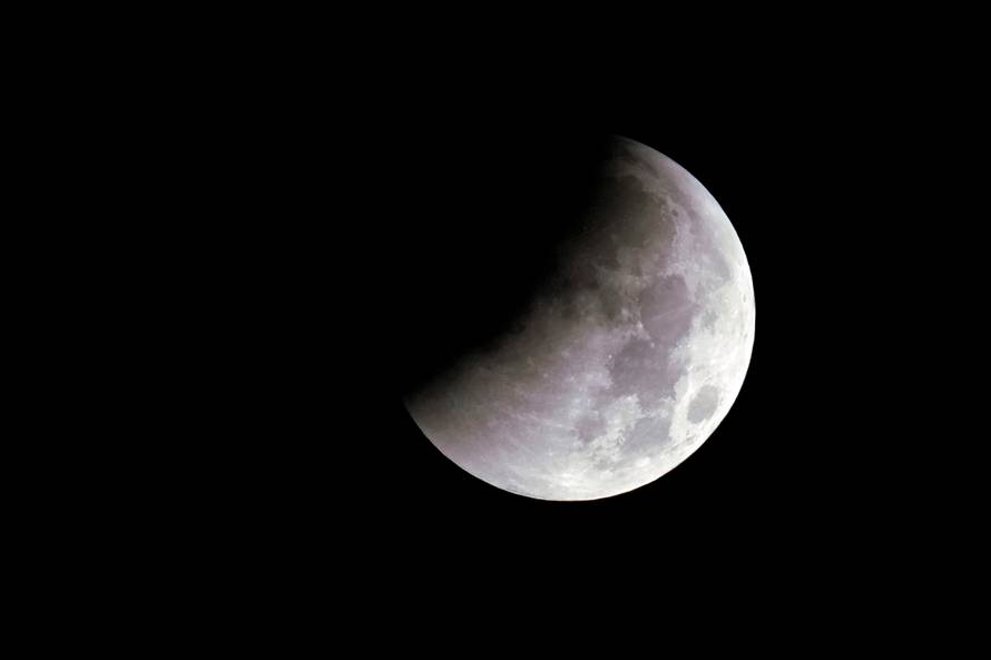 "Super Blue Blood Moon" is seen during a lunar eclipse over Shanghai