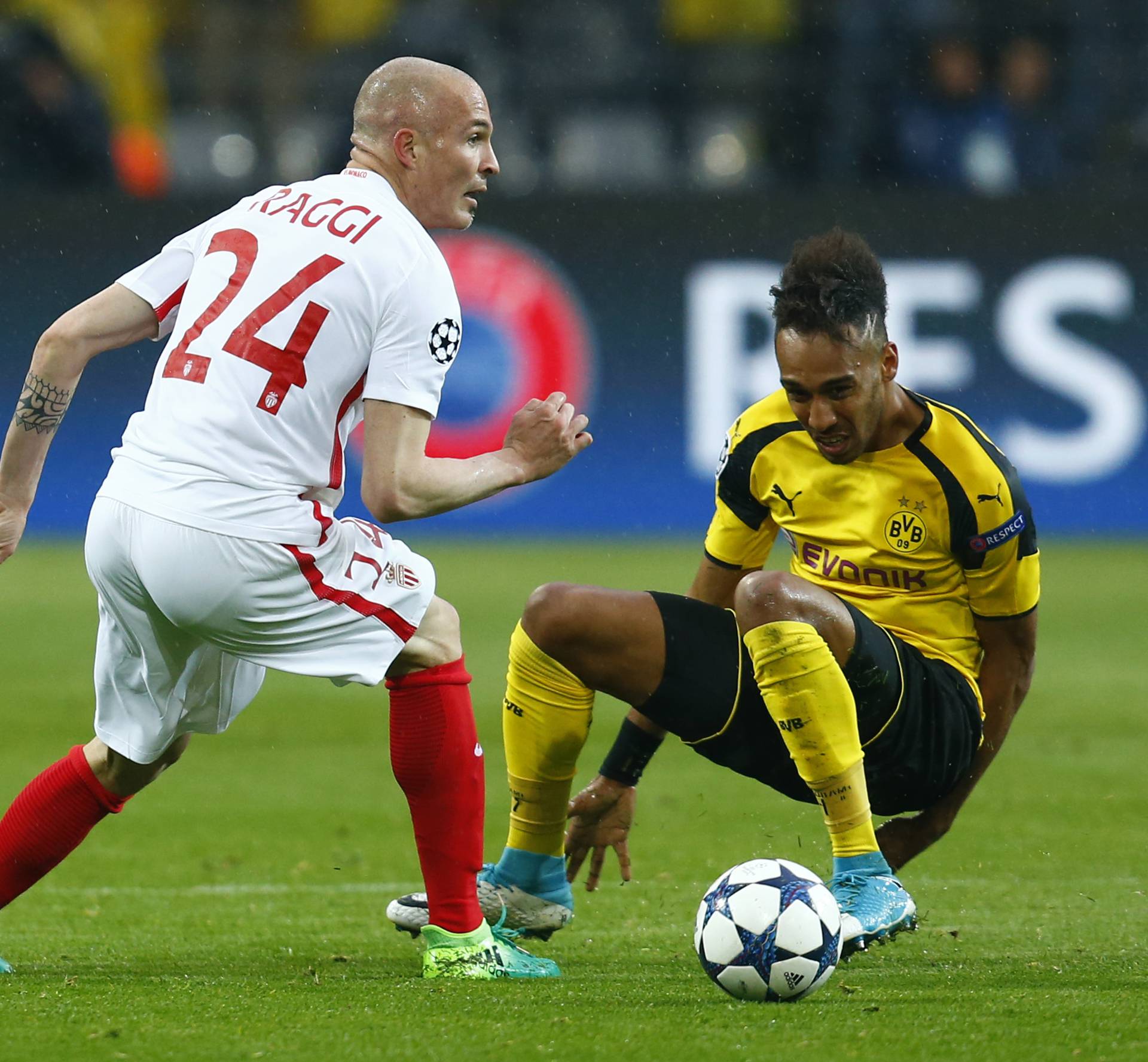 Borussia Dortmund's Pierre-Emerick Aubameyang in action with Monaco's Andrea Raggi