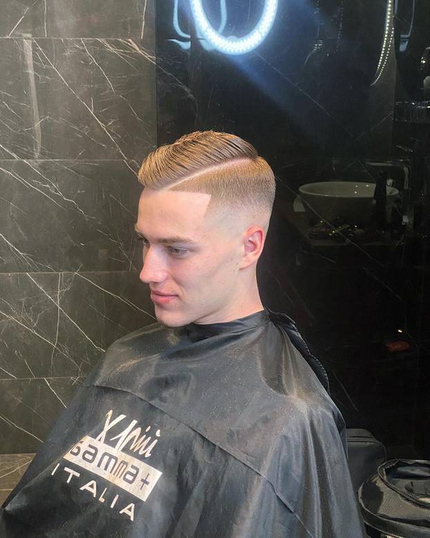 FOTO Tko je brijač 'vatrenih'? Uspio je nagovoriti Modrića na promjenu: 'Perišić? Boljelo me'