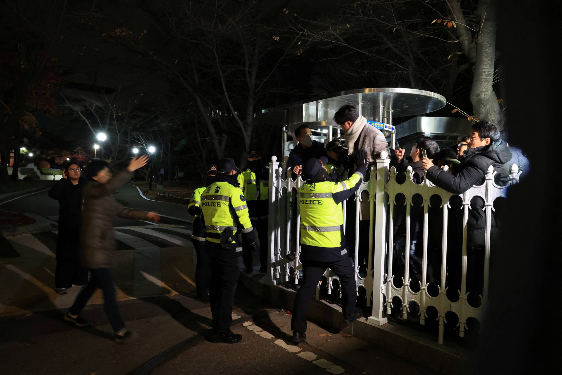 Police officers block the entry to the National Assembly after South Korean President Yoon Suk Yeol declared martial law in Seoul