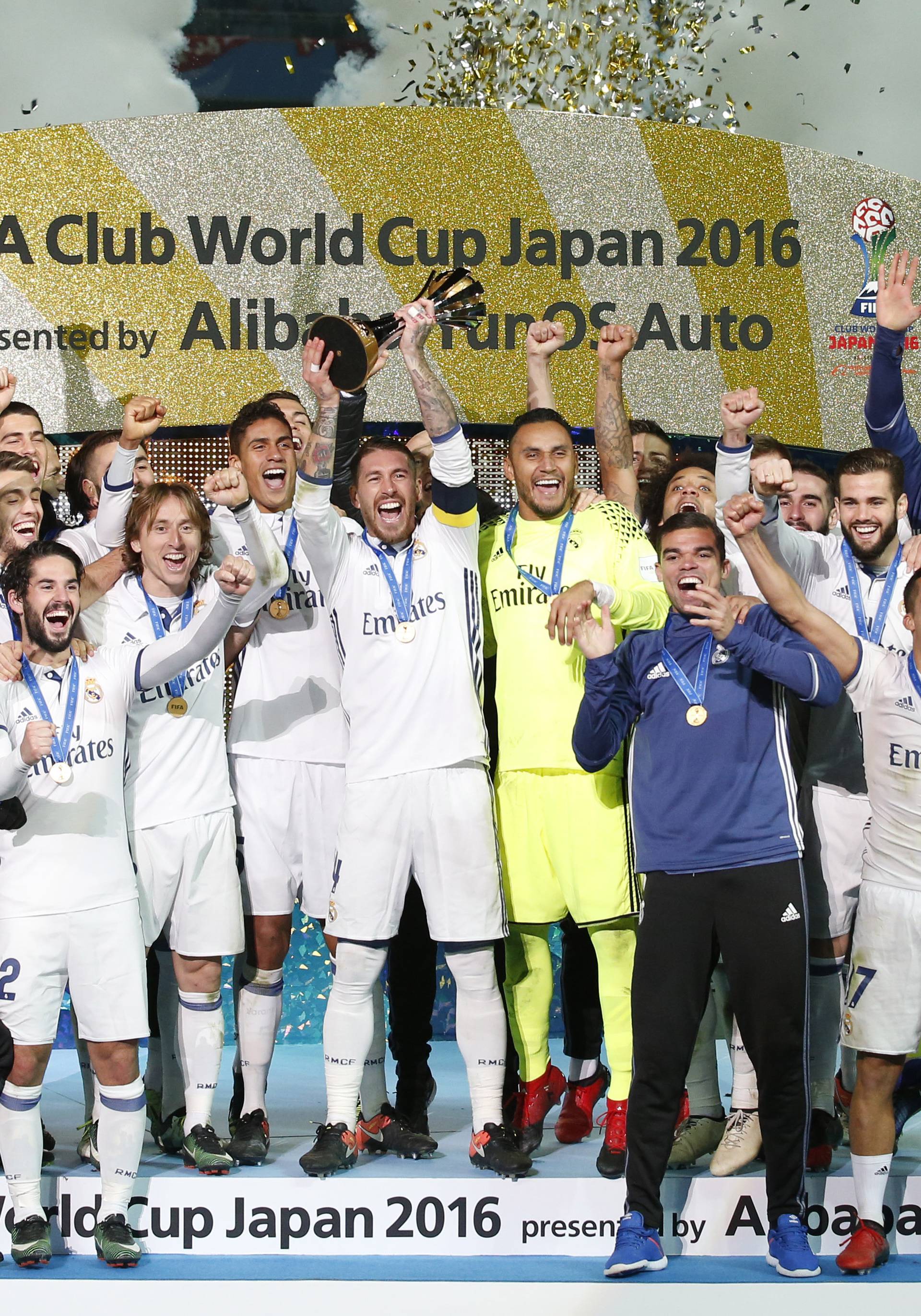 Real Madrid celebrate winning the FIFA Club World Cup Final with the trophy