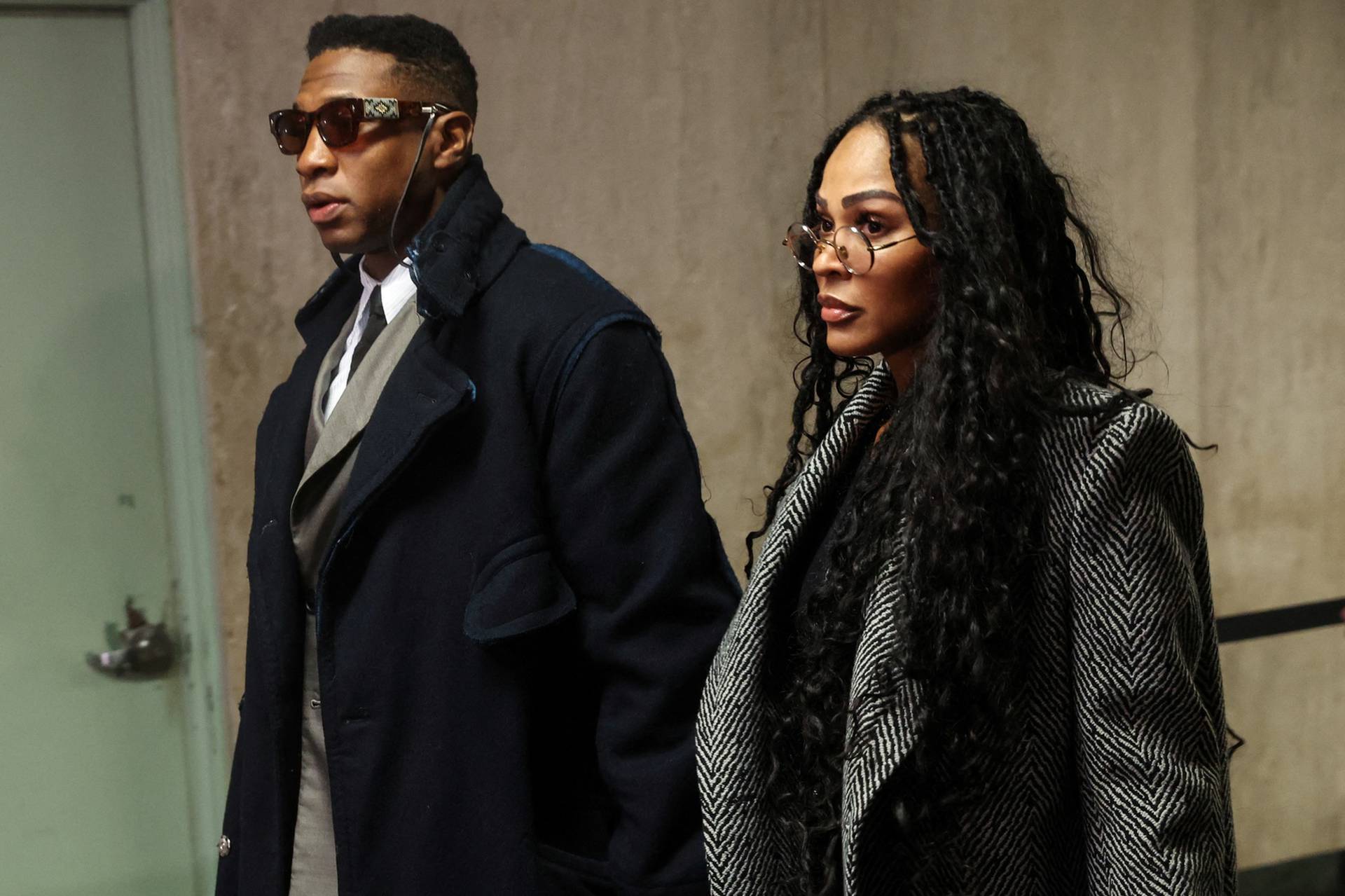 Actor Jonathan Majors arrives with Meagan Good for the jury selection in his assault and harassment case at Manhattan Criminal Court in New York City